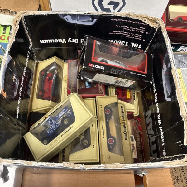 Mixed lot of boxed diecast models including Corgi and Matchbox.
