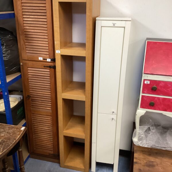 Vintage brown wooden bookcase with four open shelves.