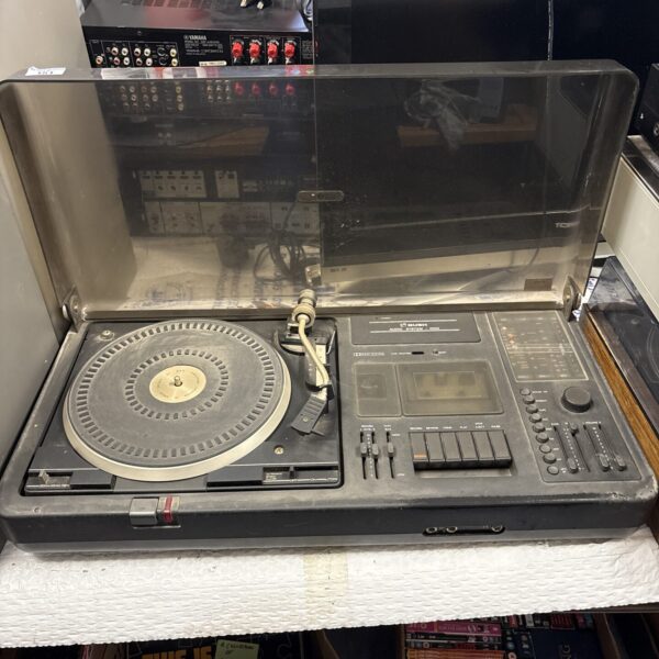 Vintage Bush 1000 audio system with turntable and cassette player.