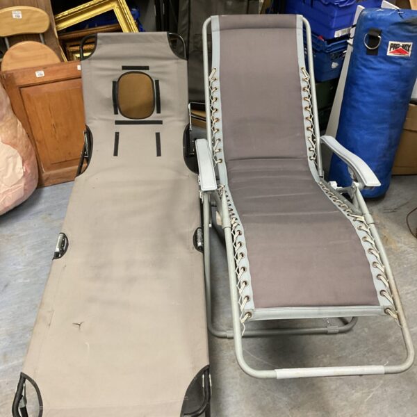 Front view of a vintage camp bed sun lounger.