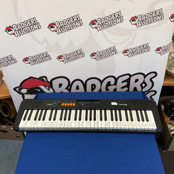 Black Casio Casiotone CT-S100 keyboard with keys visible.