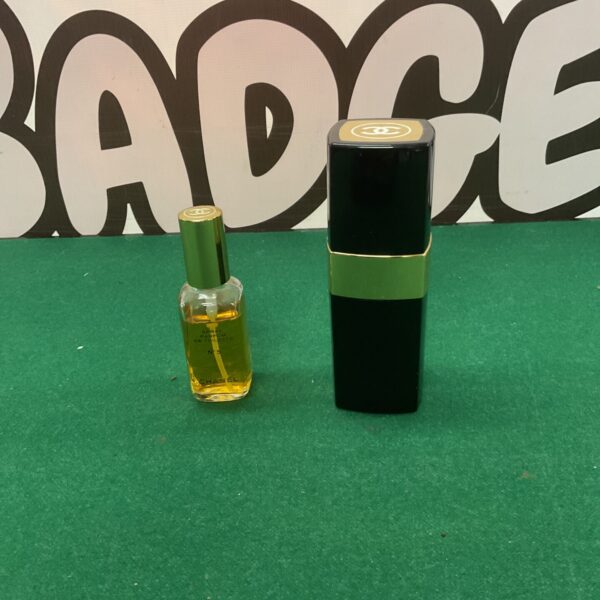Vintage Chanel No 5 perfume bottle, classic French fragrance.