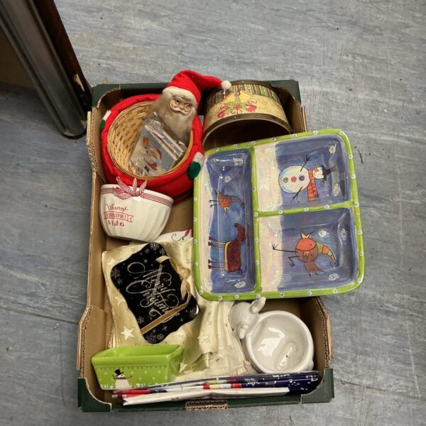 Overview of a vintage Christmas collectibles lot with a large dish.