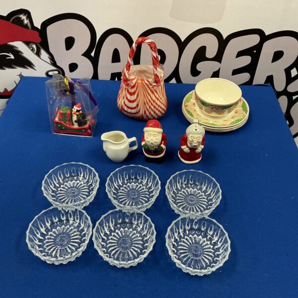 Festive Christmas tableware set with starburst patterned dishes.