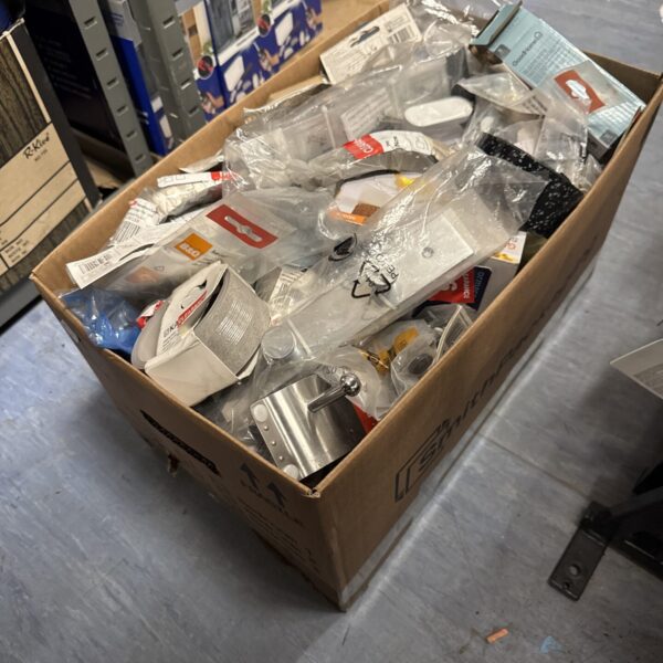 Mixed clearance lot of unbranded retail goods in packaging.