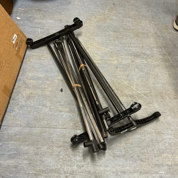 Two metal clothes rails for garment display and storage.