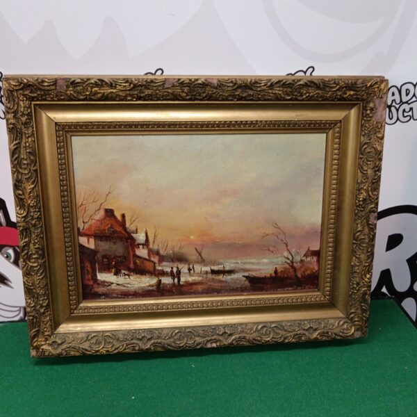 Signed coastal oil painting with a decorative gilt frame.