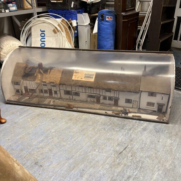 Detailed Coldharbour Wendover cottage model in clear display case.