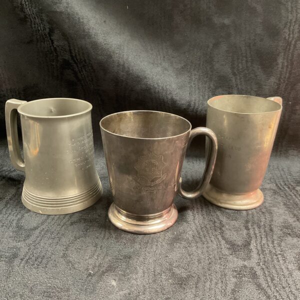 Group of three vintage Coldstream Guards tankards, silver and pewter.