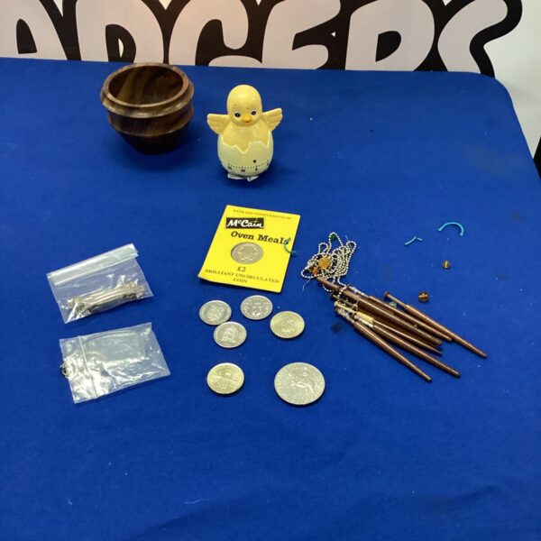 Vintage lot of collectors coins, bobbins, egg timer and hair clips.