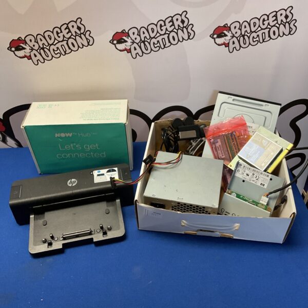 Computer parts lot featuring an HP printer and various components.