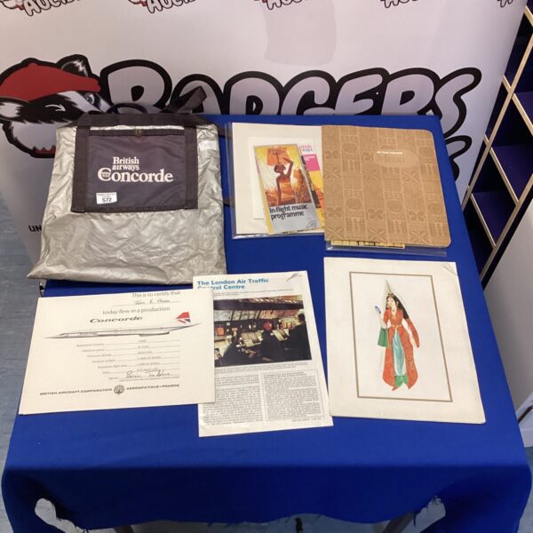 Concorde memorabilia bundle including British Airways items and aviation ephemera.