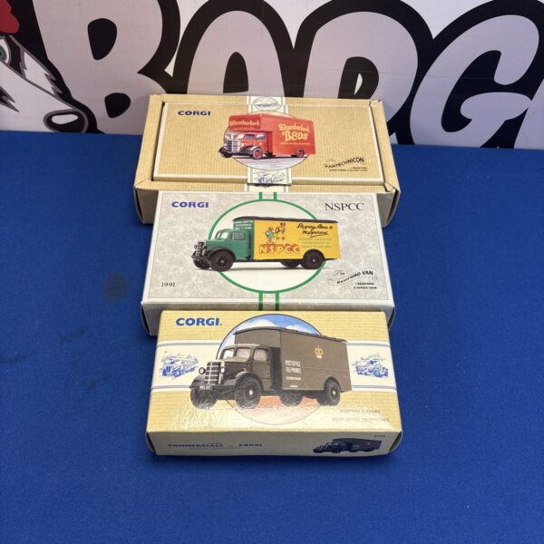 Boxed Corgi diecast models, vintage collectible vehicles.