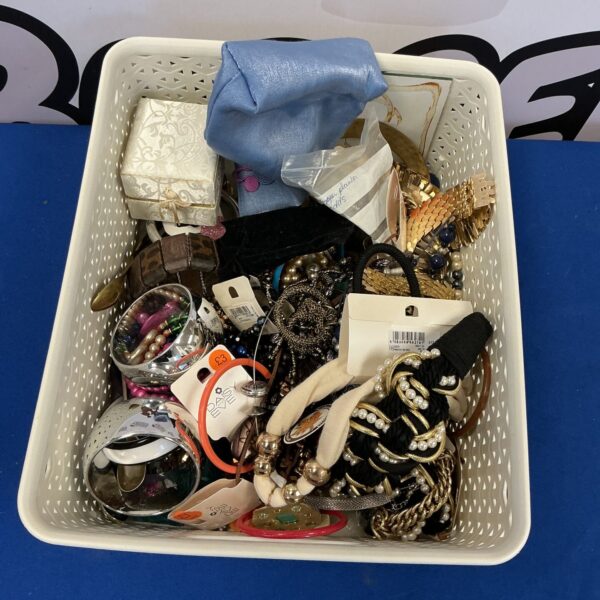 Mixed lot of costume jewellery including bangles and necklaces.