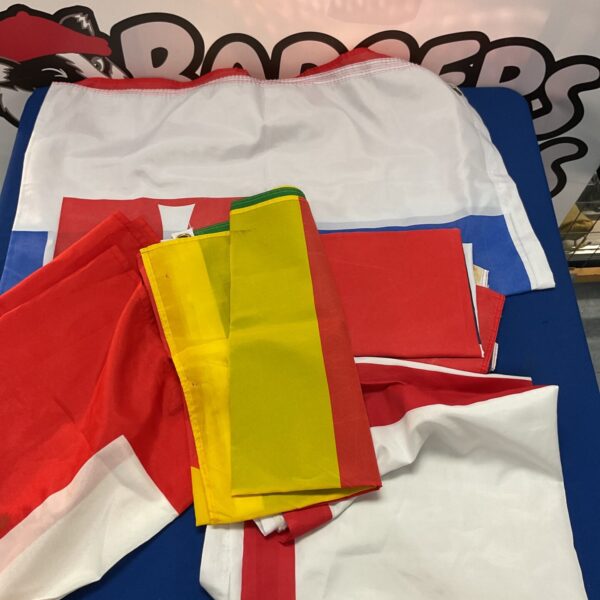 Lot of five colourful country flags for collection or display.
