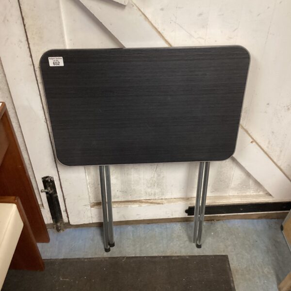 Vintage Danish folding table with laminate top and metal frame.