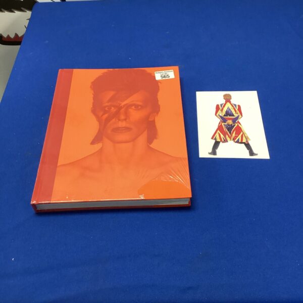 Sealed copy of the David Bowie Is exhibition book.