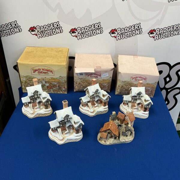 Detailed David Winter Cottage model 306, a collectible miniature building.