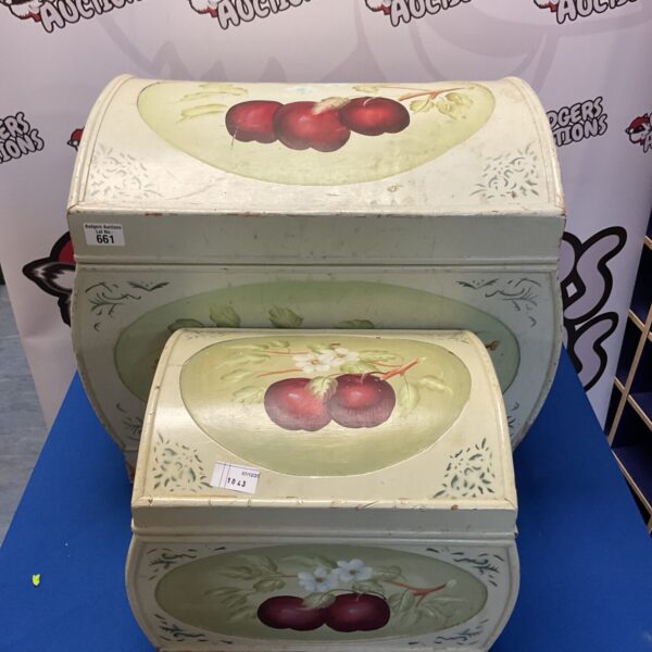 Hand-painted floral designs on decorative artisan chests.