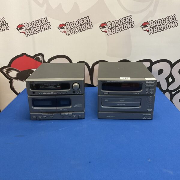 Silver Denon D-C30 CD changer amplifier, vintage audio equipment.