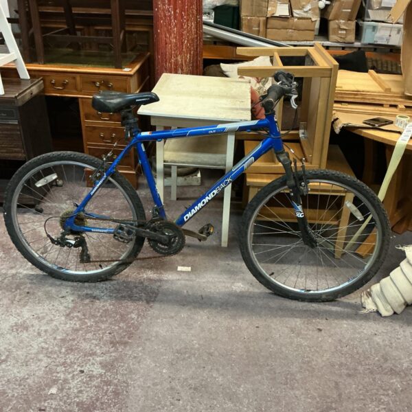 Blue Diamondback Outlook mountain bike for outdoor recreation.