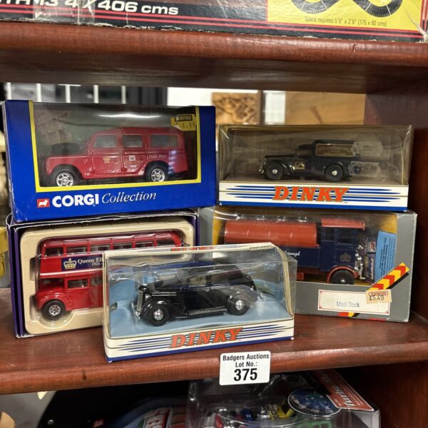 Five boxed diecast model vehicles from Dinky Toys and Corgi.