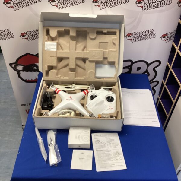 DJI Phantom FC 40 drone in open box, aerial photography equipment.