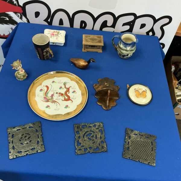 Vintage ceramic plate with a colourful dragon design.