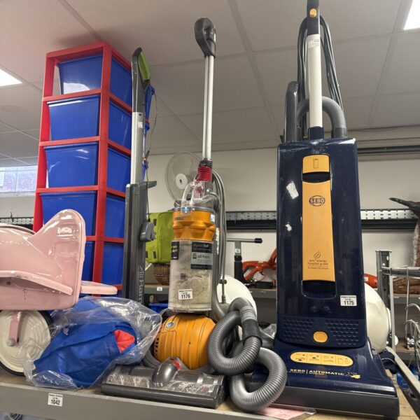 Dyson DC24 ball vacuum cleaner in a home setting.