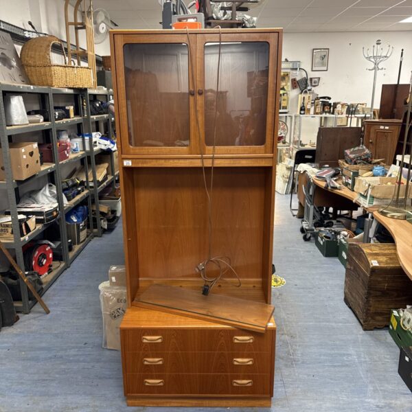Full view of a vintage E Gomme display cabinet in teak.