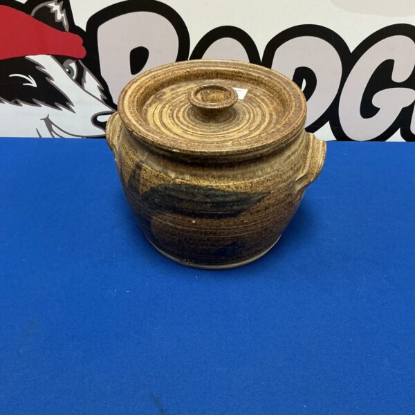 Rustic earthenware cooking pot, handmade ceramic kitchenware.