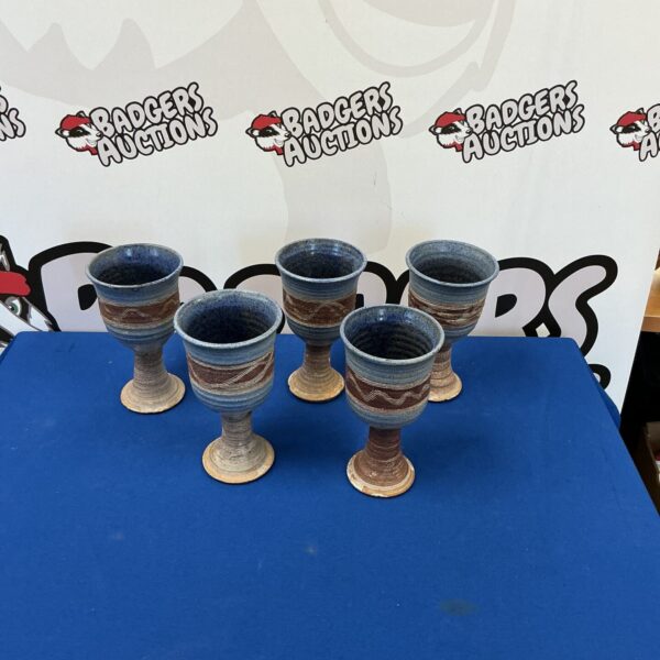 Lot of five vintage earthenware goblets with blue glaze.