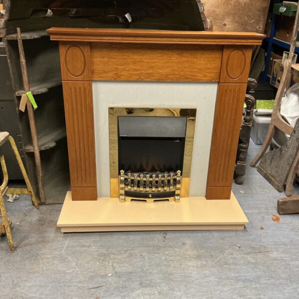 Front view of a wood effect electric fireplace suite.