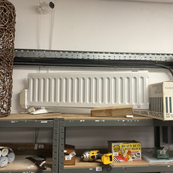 Used floor standing electric radiator for home heating.