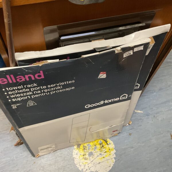 Chrome Elland towel rack for bathroom storage, showing signs of use.