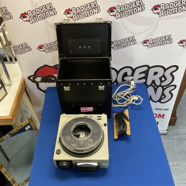 Vintage Elmo ST-1000 slide projector, a classic piece of classroom equipment.