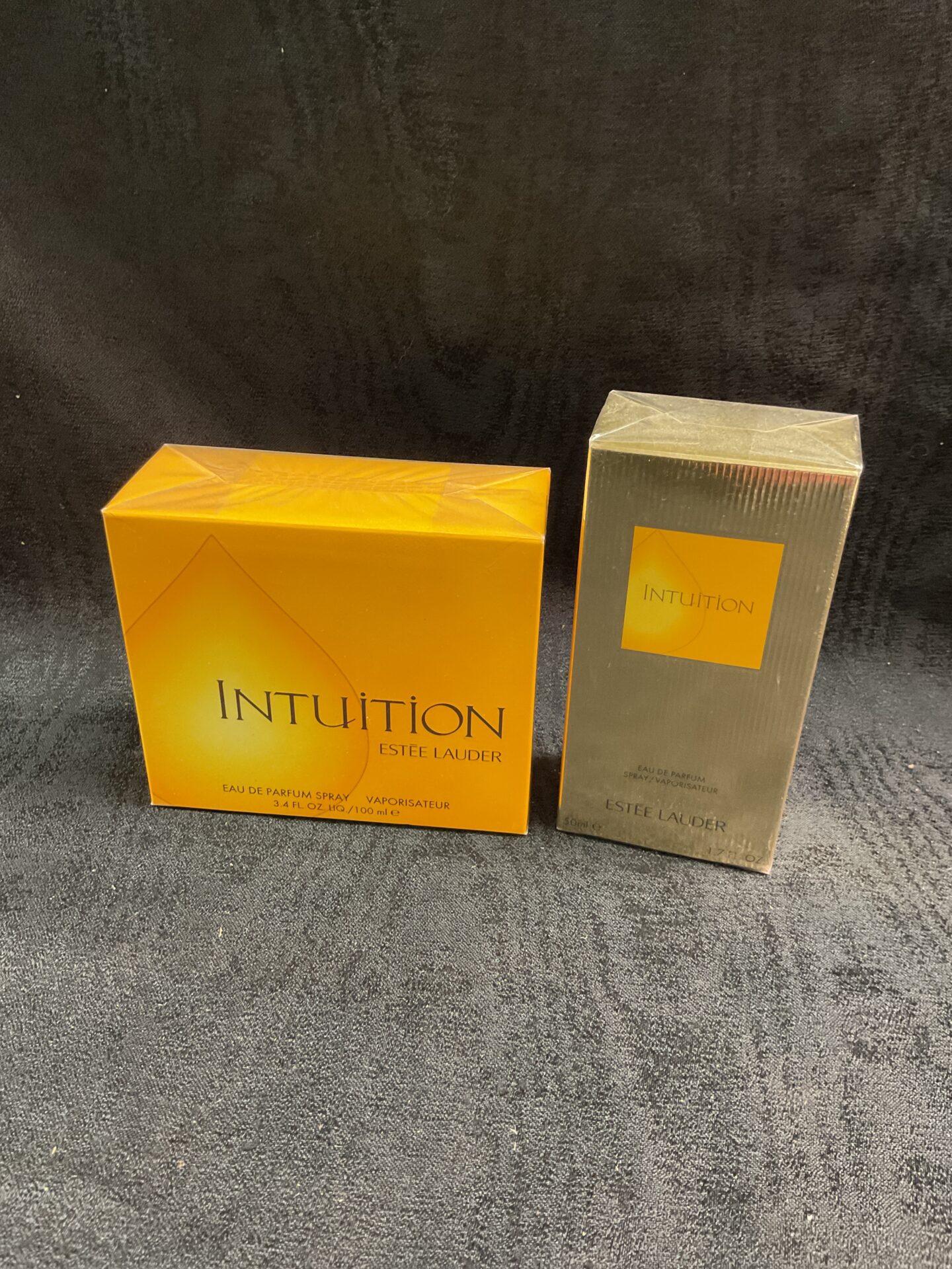 Sealed bottle of Estee Lauder Intuition Eau de Parfum perfume.
