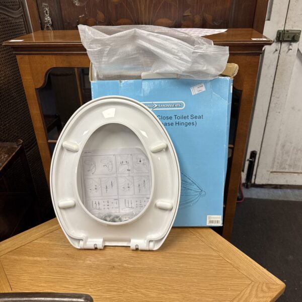 Euroshowers soft close toilet seat still in its original packaging.
