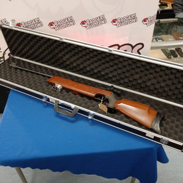Feinwerkbau LG300S air rifle in a hard case, side lever action.