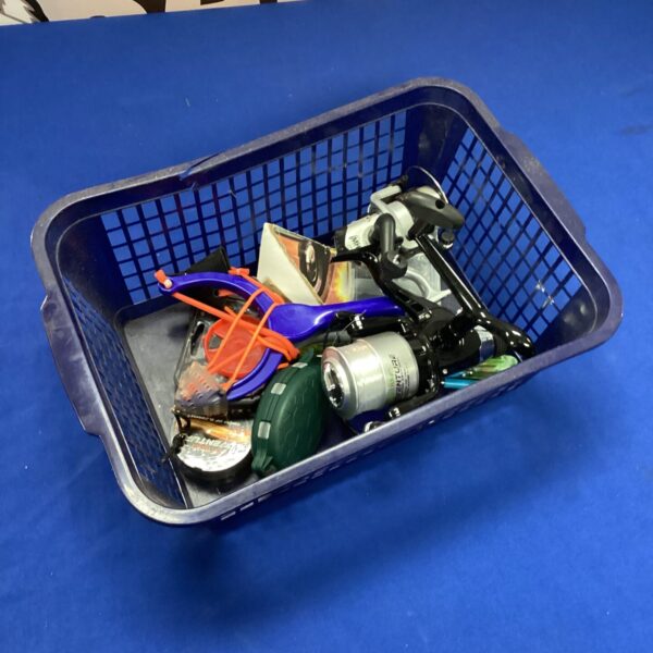 Vintage fishing reel lot with bait shot for collectors.