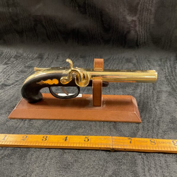 Detailed flintlock pistol replica petrol table lighter.