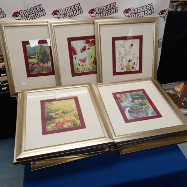 Large lot of sixteen framed floral still life prints for home decor.