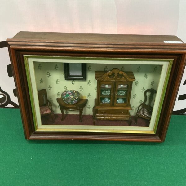 Vintage framed diorama of a detailed miniature living room scene.