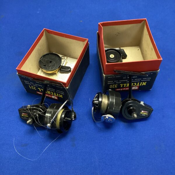 Vintage Garcia Mitchell 320 and 321 spinning reels for collectors.