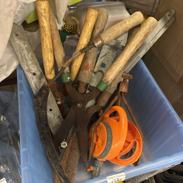 Mixed lot of garden tools and accessories for gardening tasks.