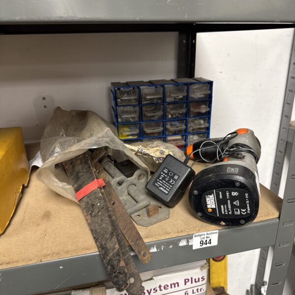 Used garden tools and hardware from a shed clearance lot.