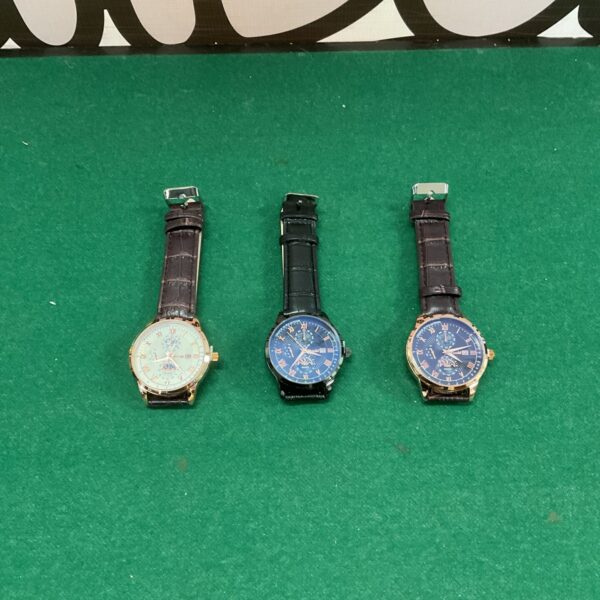 Lot of three gents Poshi watches with leather straps.