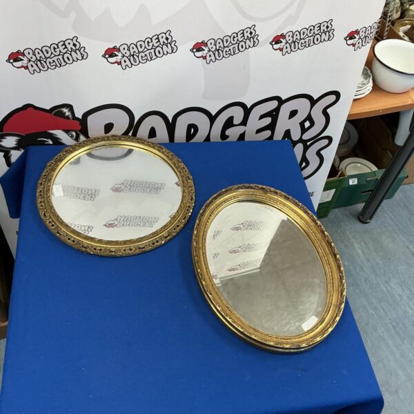 Pair of antique gilt framed mirrors for wall decoration.