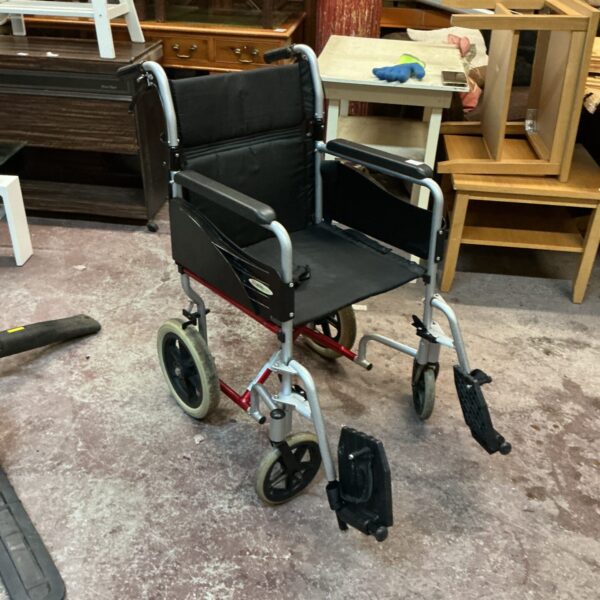 Lightweight Go Mobility folding wheelchair for easy portability.