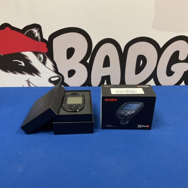 Godox TTL wireless flash trigger for remote camera control.